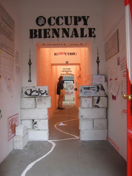 Inside entrance to the KW Institute Contemporary Art during the 7th Berlin Biennale and installation shot of “Global Square” encampment. Image courtesy of the artist.