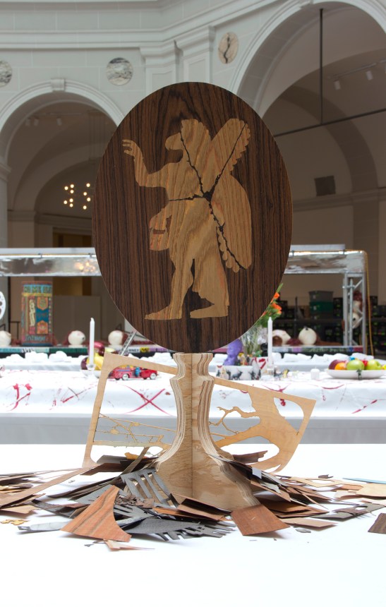 Alison Elizabeth Taylor, Eagle-Headed Winged Diety, 2013,wood veneer, shellac, oil paint. Courtesy of The Artist / Courtesy James Cohan Gallery, New York/Shanghai