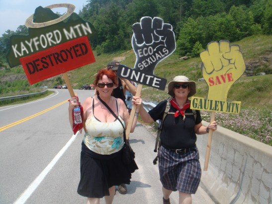 Annie Sprinkle and Beth Stephens, Protest march on Blair Mountain. Photo by Jordan Freeman
